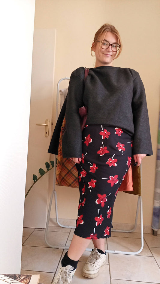 Black skirt with flowing red flowers